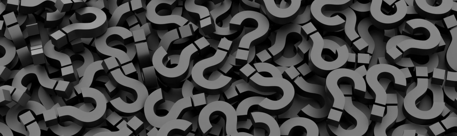 A scatter of question marks